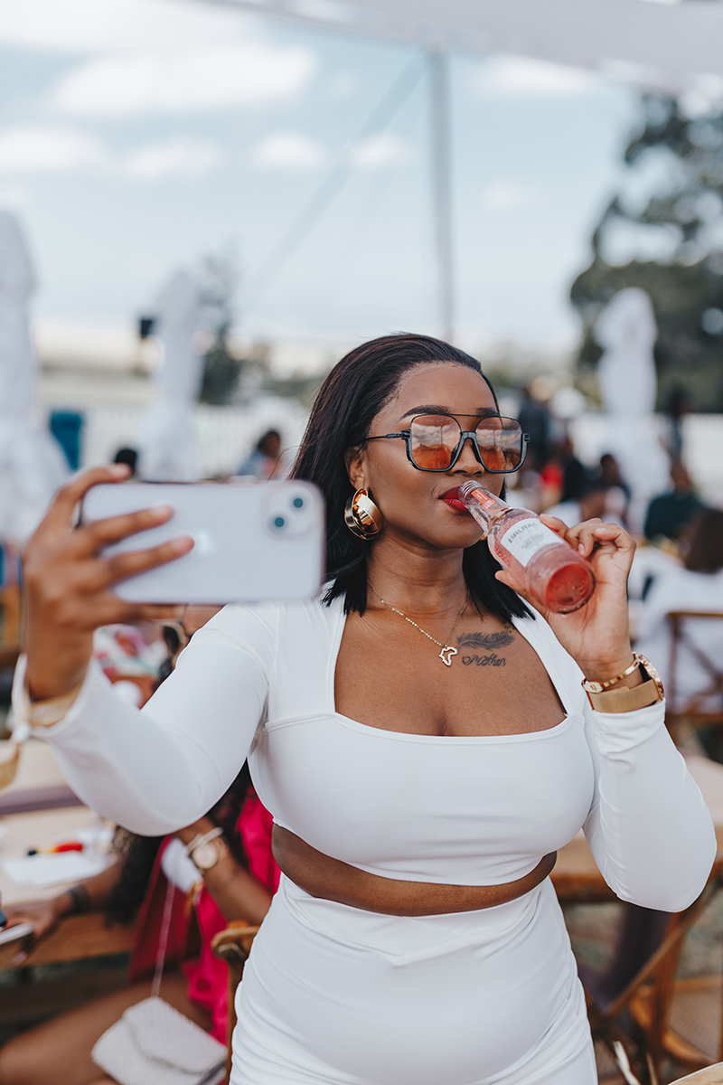 Woman drinking Brutal Fruit
